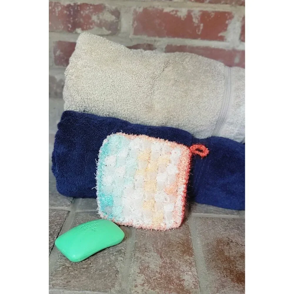 Sea foam green and coral shower scrubby